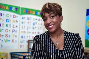 Portrait of Sally Boyd, director of family child care program, smiling